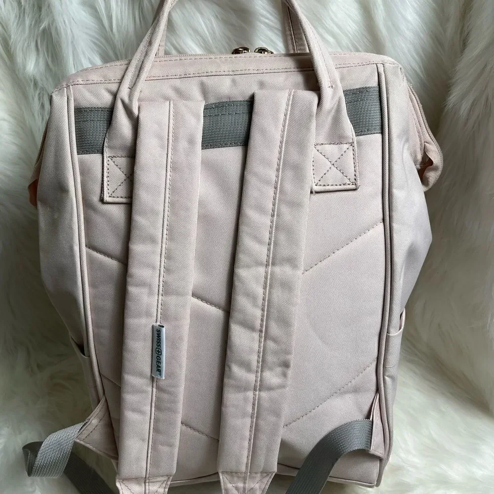 Swiss Gear light pink canvas multi purpose backpack with Rose gold Hardw…